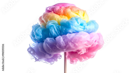 A vibrant, layered rainbow cotton candy treat on a stick against a black backdrop