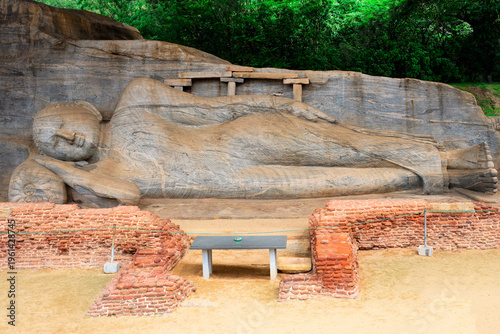 Reclining Buddha statue at Polonnaruwa ruins from the 12th century in Sri Lanka