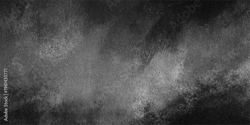 A dark grunge texture featuring an aged black and white concrete wall pattern with a dirty vintage paper surface design for a blank grey chalkboard background