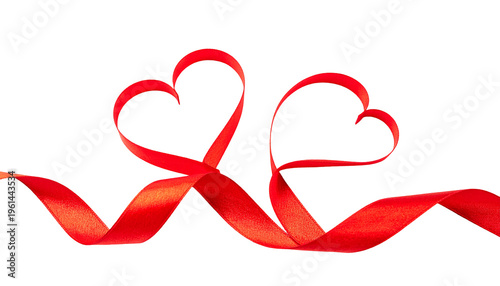 Two red ribbons, shaped as hearts, intertwine against a solid black background