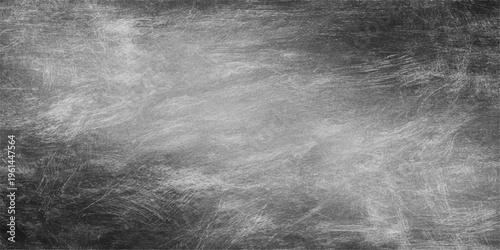 A dark grunge black and white background featuring a textured stone wall pattern with a rough aged concrete surface and dirty vintage paper design