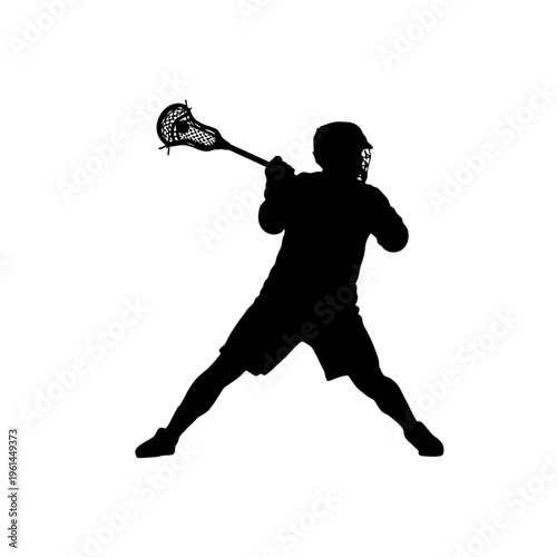Silhouette of Lacrosse Player Swinging a Lacrosse Stick in Action on the Field.