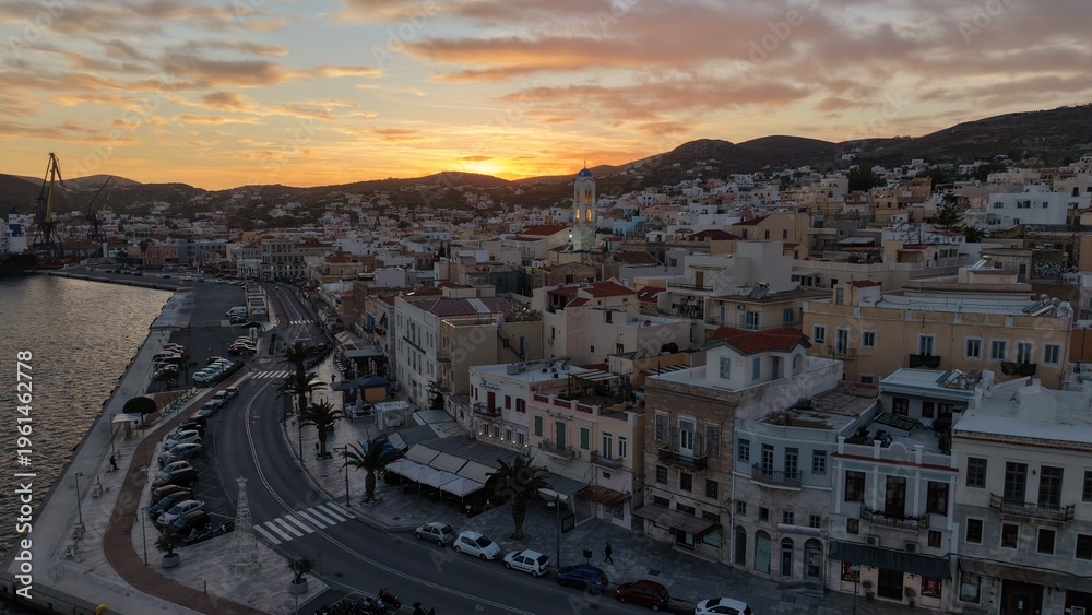 Fototapeta premium Golden Hour Aerial of Syros-Ermoupoli Coastal Road