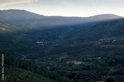 Sun rays over Sierra de Gata valley