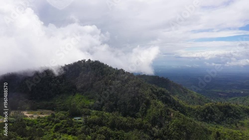 Aerial view of the mountain range is covered with evergreen rainforest. Philippines, Mindanao.
