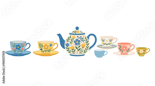 A charming collection of teacups and a teapot adorned with floral patterns, perfect for a cozy afternoon tea