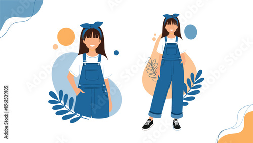 Two happy young girls in stylish blue denim overalls and matching headbands posing against a creative abstract background.