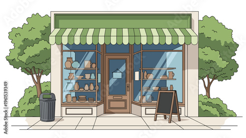 Quaint pottery and ceramics shop storefront with various clay pots and vases displayed in the large glass windows.