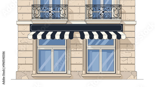 Close up view of an upscale building facade featuring ornate balconies and a striped black and white awning.