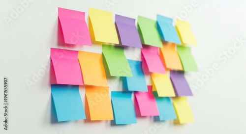 Colorful Sticky Notes on White Wall A Reminder System.