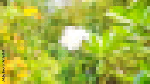 Abstract mosaic background with yellow and green square pixels and a white center