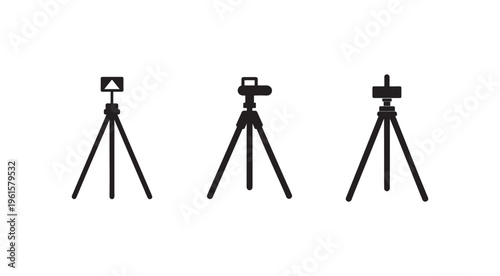 Three black tripods with different camera equipment on top for photography and videography purposes