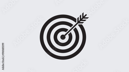 A black and white illustration of a target with an arrow hitting the bullseye, symbolizing accuracy and success.