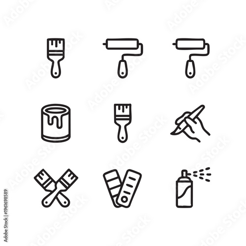 The collection of various painting tools and supplies on a clean surface includes a paintbrush, roller, paint can, sprayer, and other equipment used for application and measurement.