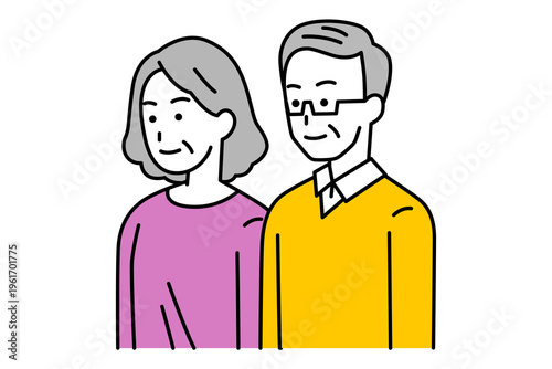 まっすぐ前を向いている年配の男女