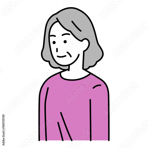 まっすぐ前を向いている年配の女性