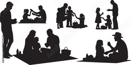 Silhouettes of happy family spending quality time together outdoors