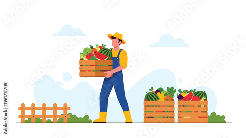 Male farmer in yellow hat and blue overalls carrying a wooden crate filled with fresh vegetables and watermelon in a rural field.