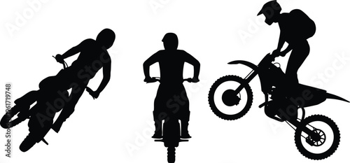 Silhouettes of motocross riders performing extreme stunts on their dirt bikes