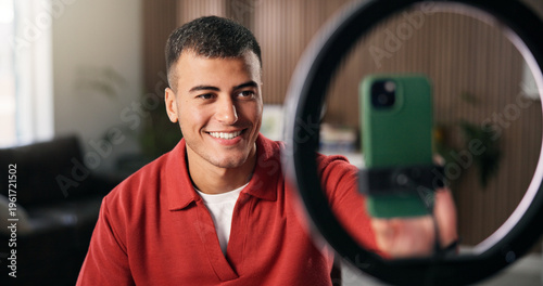 Fotografi Man, streamer and phone with ring light in home for content creation, influencer and recording video