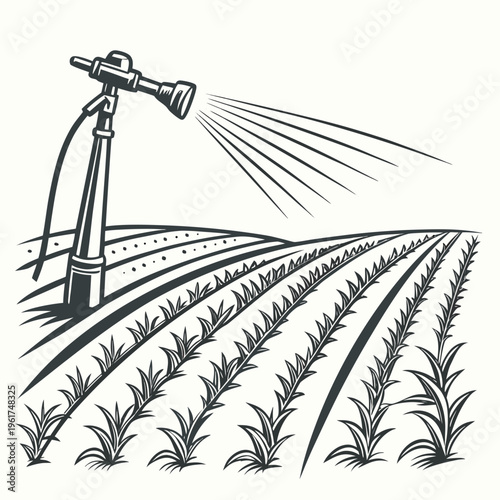 An irrigation sprinkler watering a crop field