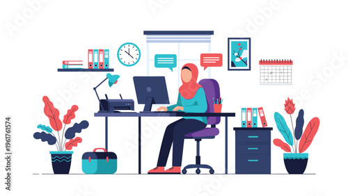 Professional woman wearing a hijab works efficiently at her computer in a well-organized and colorful home office space.