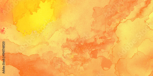 Vibrant orange and yellow watercolor background with abstract texture and fluid shapes for design and artistic projects