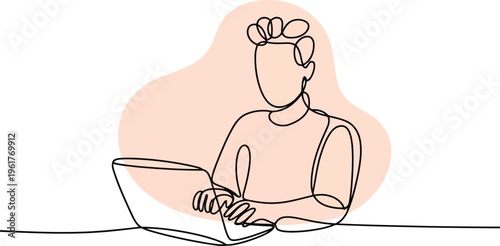 A person works diligently on a laptop computer with an orange background accent