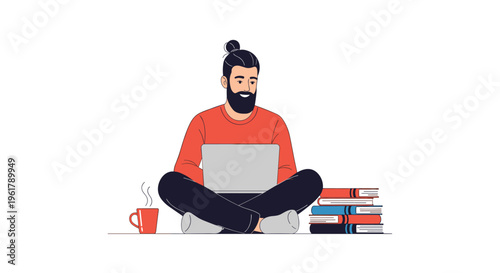 Bearded man with a man bun studying or working remotely on a laptop while sitting cross-legged on the floor with books.