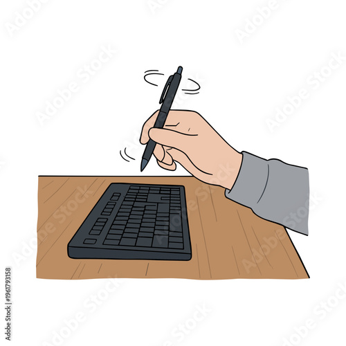 A hand holding a stylus hovers over a keyboard on a wooden desk indoors.