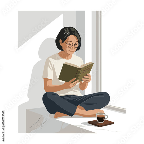 Woman sitting by window reading book with coffee