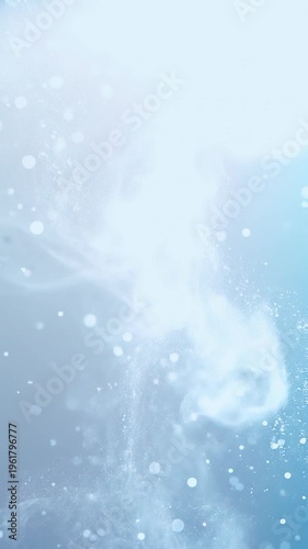 Soft abstract background with floating light particles and gentle motion. Light blue. Vertical.