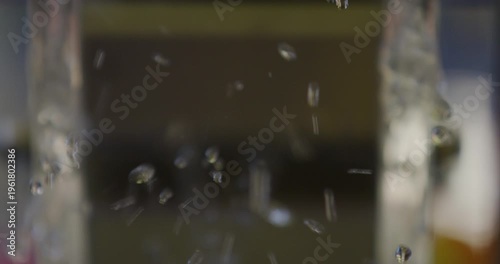 Water Wheel and Droplets Splashing Slow Motion Close