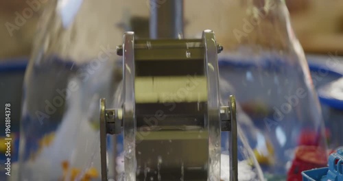 Water Dripping into Blue Platter