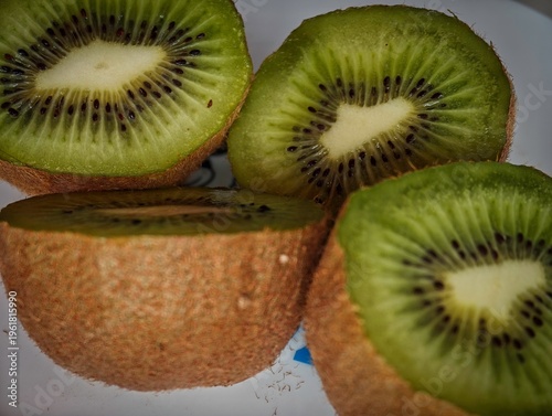 High resolution color close up image of Fresh Kiwi Slices Macro Close Up – Vibrant Green Organic Fruit Texture Healthy Food Background