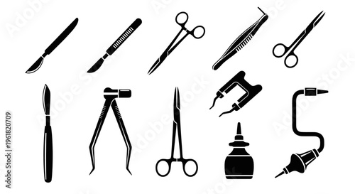 Medical tools and equipment for surgery are laid out on a table indoors.