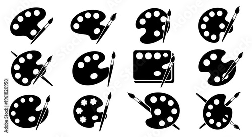 Various paint pallets and brushes arranged neatly on a surface for artistic use indoors