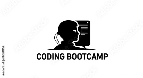 A coding bootcamp participant intensely focuses on computer screen.