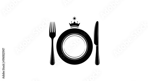 A formal table setting with a plate, fork, knife, and crown on the plate.