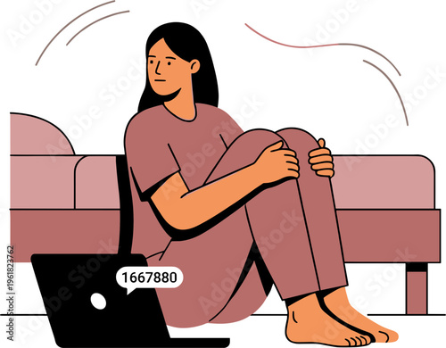 A woman sits on the floor with a laptop in front of a couch