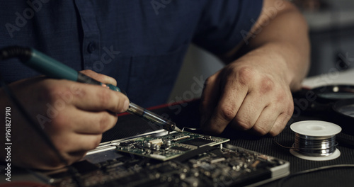 Fotografía Soldering, repair or hands in workshop with circuit board, inspection or wiring assemble in hardware check