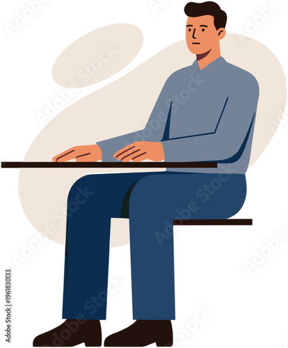 A man sits on a chair at a table indoors