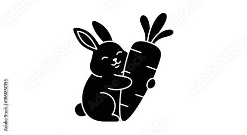 Cute rabbit holding a carrot.