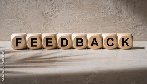 Wooden Blocks Spelling Out the Word Feedback.