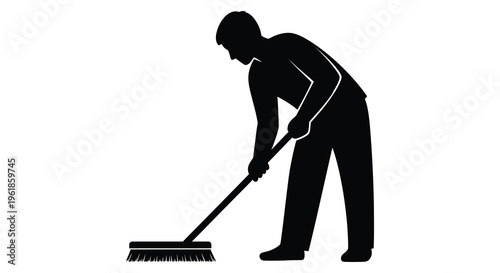 A person sweeping the floor depicted in a stark black silhouette