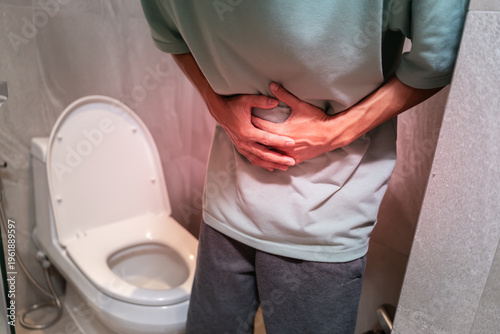 Constipation and diarrhea in bathroom. Hurt man touch belly  stomach ache painful. colon inflammation problem, toxic food, abdominal pain, abdomen, constipated in toilet, stomachache, Hygiene