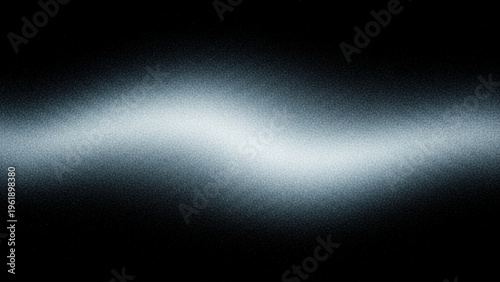 A blurry, abstract image featuring a bright horizontal light streak.