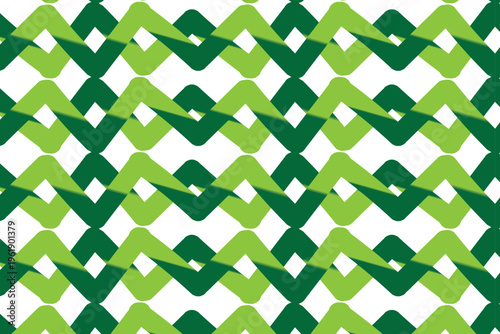 Green and white abstract pattern featuring repeating zig zag and diamond shapes, creating a textured and visually interesting background design