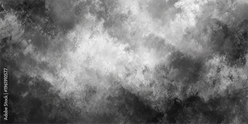 Dark grunge texture background featuring a stormy black and white cloudscape with misty smoke and dramatic light motion