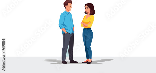 Two colleagues communicate seriously standing apart with arms crossed.